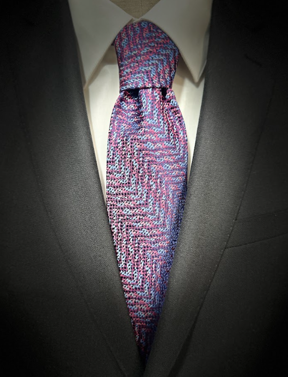 Purple and Navy Tie with Suit From New Textured Tie Collection with Spotlight